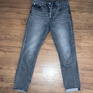 Levi’s 501 straight distressed black jeans.
